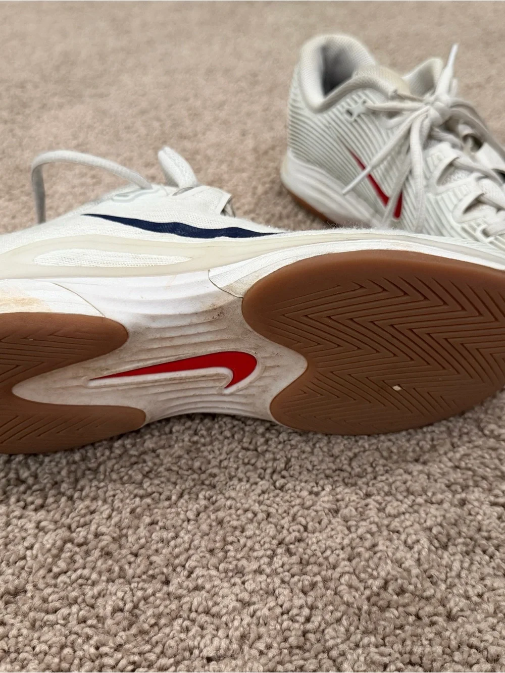 Nike White Sneakers with Navy Swoosh and Gum Outsole